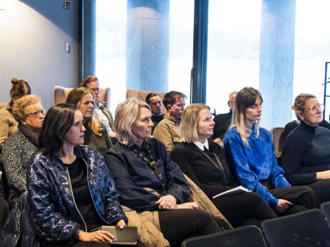 attendees seated in the Pollur room during the presentation of the Health and Well-being of LGBT+ People study
