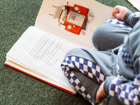 Child reading a book