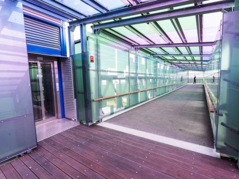 elevator and colorful pedestrian bridge