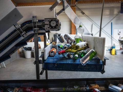 bottles and cans in recycling machine