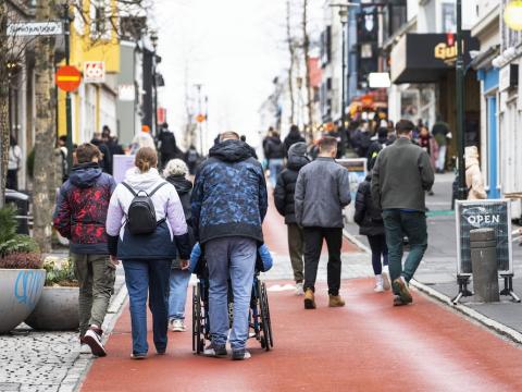 people walking on pedestrian street