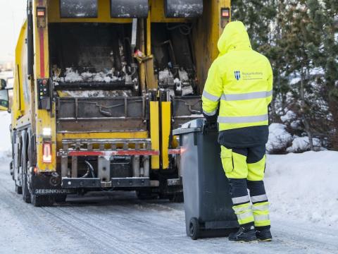 waste collection vehicle and employee