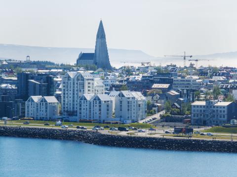 Aerial view of the city, seen from the sea toward Sæbraut and Hallgrímskirkja.