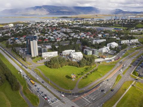 Intersections, biking paths, streets, buildings and greenery