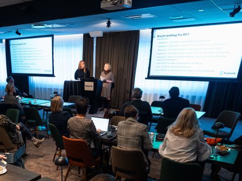 Katrín Harpa and Aðalbjörg Traustadóttir on the panel at a conference on disabled people's issues. 