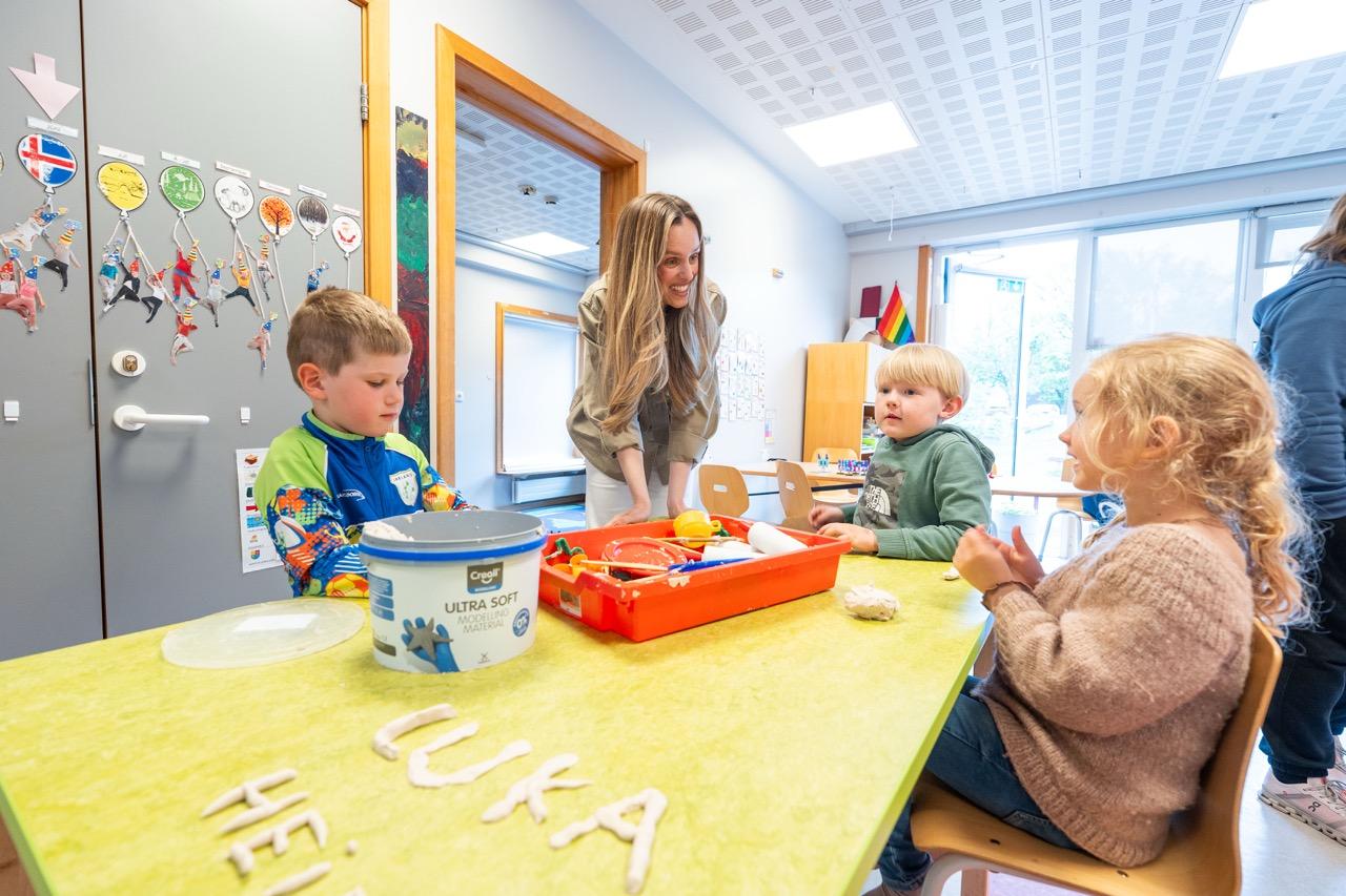 Mayor Hildur Björnsdóttir meets with children at Hof Preschool.