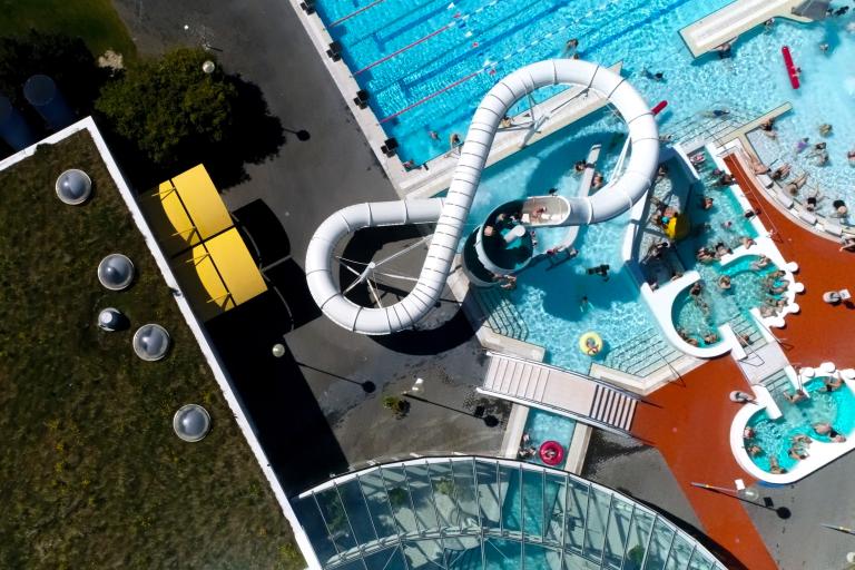 Aerial view of Árbæjarlaug swimming pool in summer