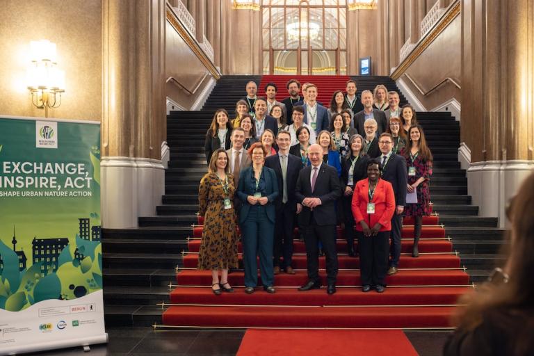 a group of people standing on steps
