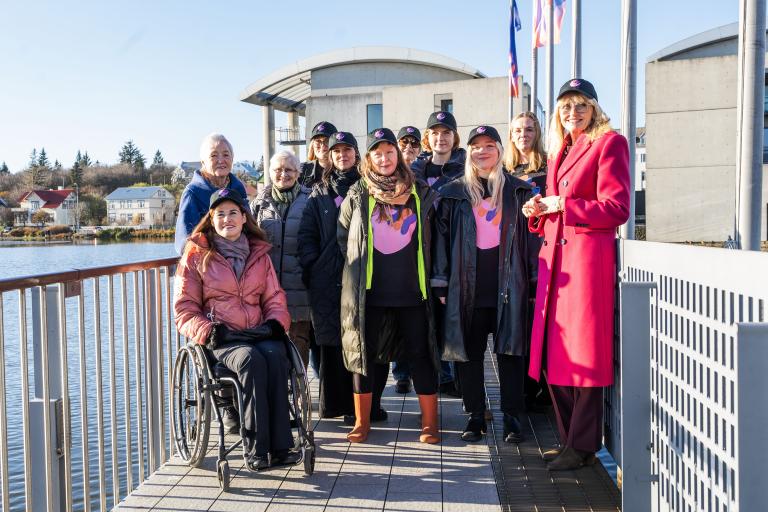 Group of women on the bridge at City Hall