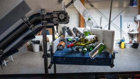 bottles and cans in recycling machine