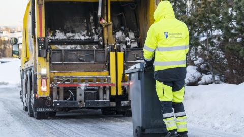 waste collection vehicle and employee