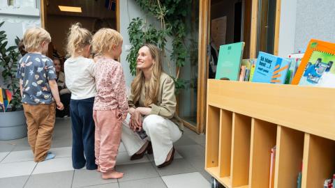 Mayor Hildur Björnsdóttir meets with children at Hof Preschool.